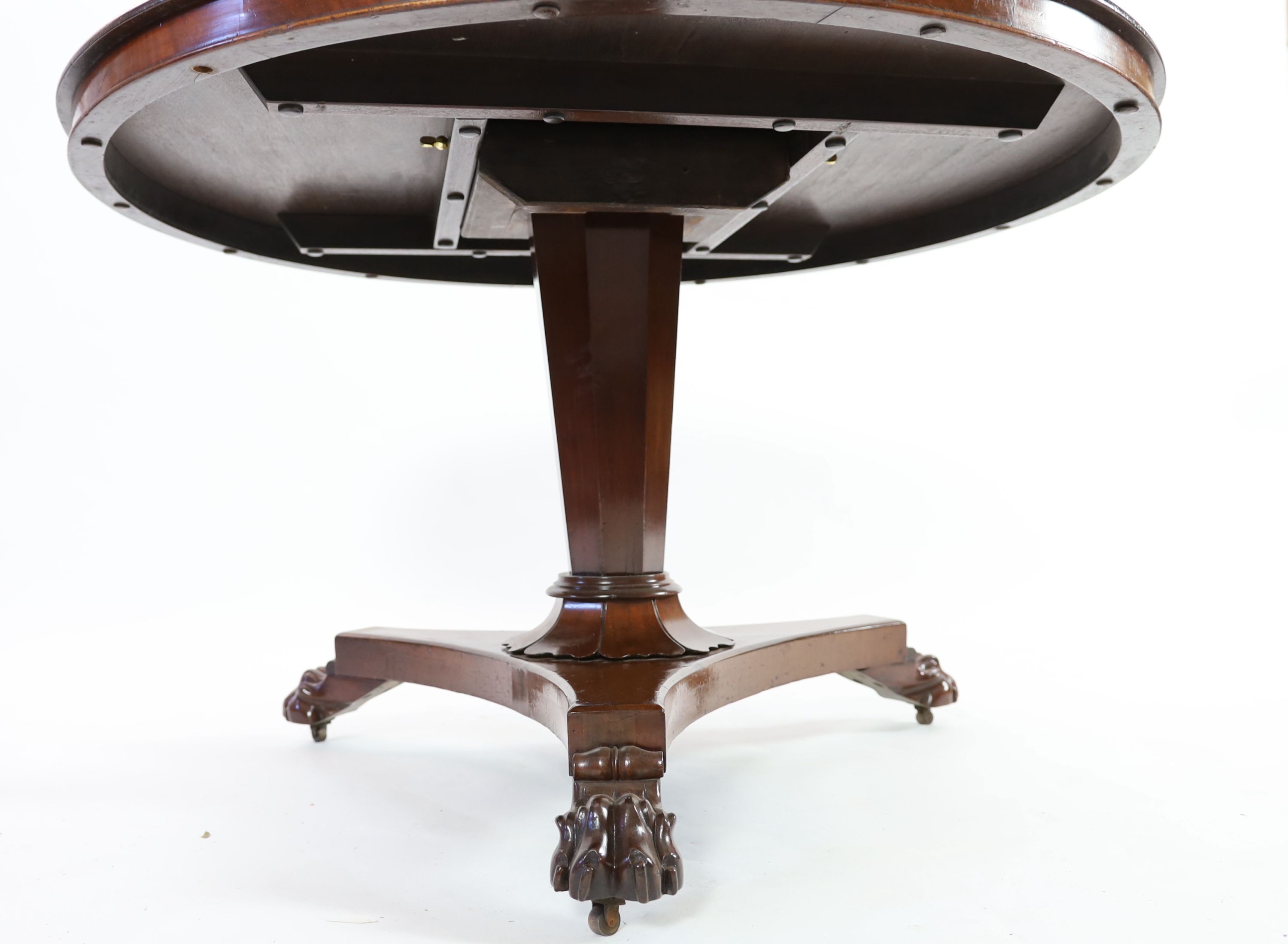 A William IV circular mahogany tilt top breakfast table, on octagonal tapered pillar, diameter 116cm height 73cm